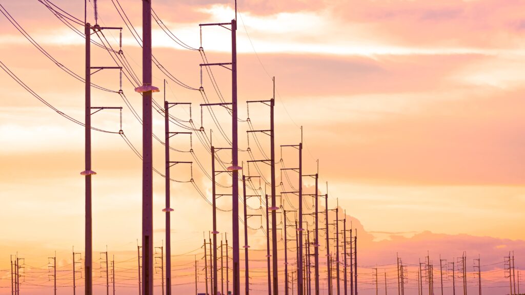 Power lines infront of a sunset - Everest Wealth
