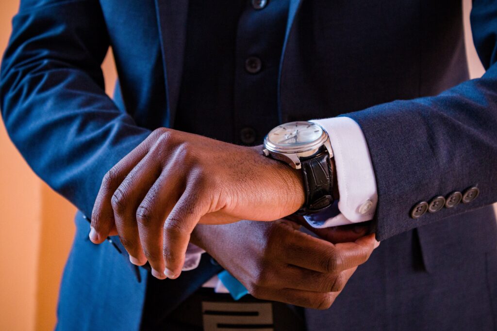 man wearing a suit and stylish luxury watch - Everest Wealth