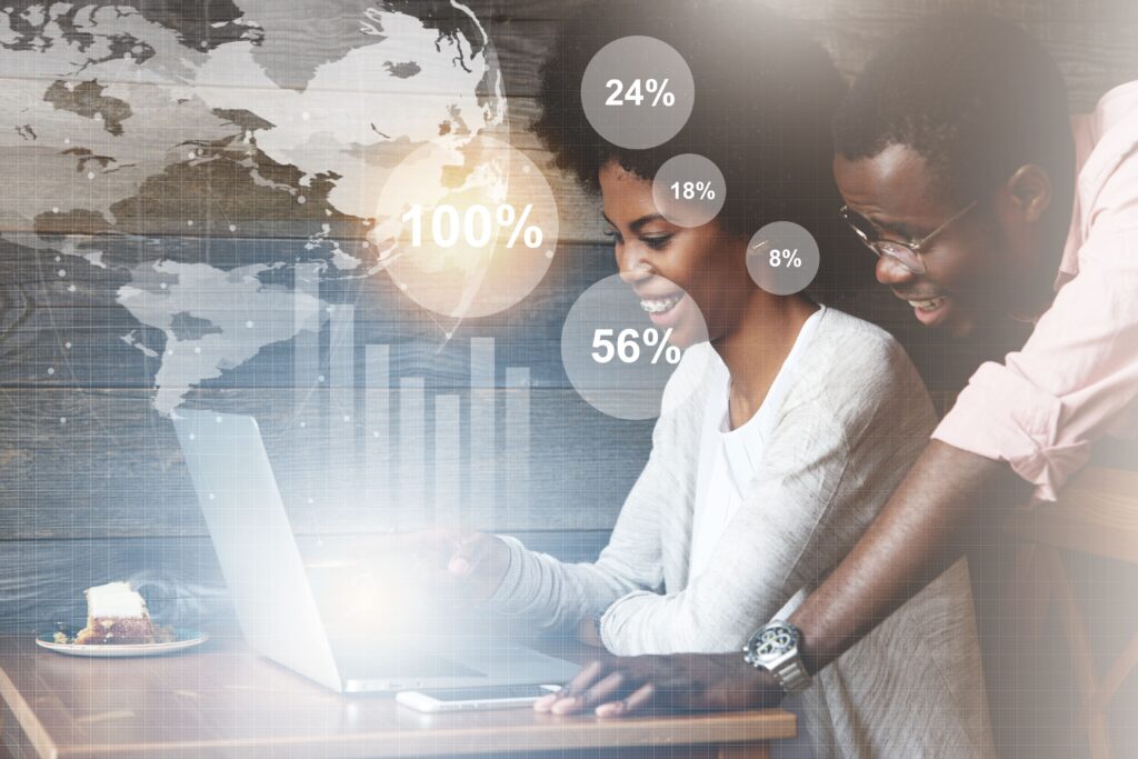 Man and woman looking at marketing statistics - Everest Wealth