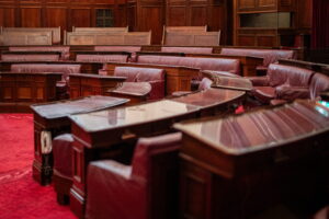 Davos Diplomacy and Domestic Scrutiny Shape the Day (Empty parliament room)