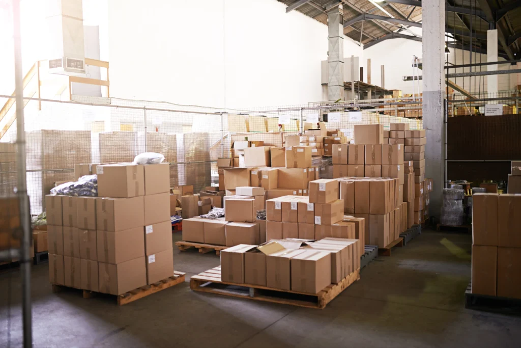 Structural Failures Weigh Clothing Sector (Boxes in a factory)