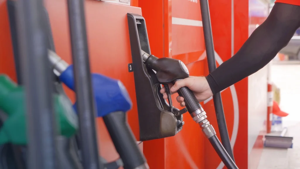 2026 could mark a visible facelift for South Africa as Ramaphosa pushes reform while markets, tax data, fuel prices tell a complex story (Petrol attendant grabbing a petrol pump)