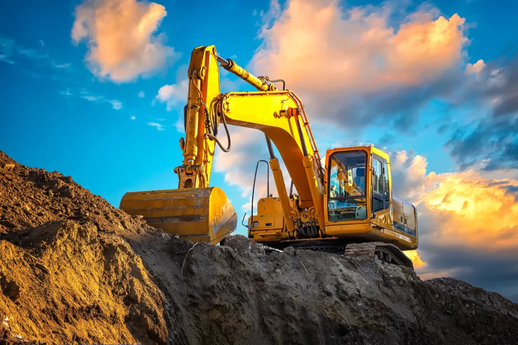 Barloworld exits public markets (Excavator on a mining site)