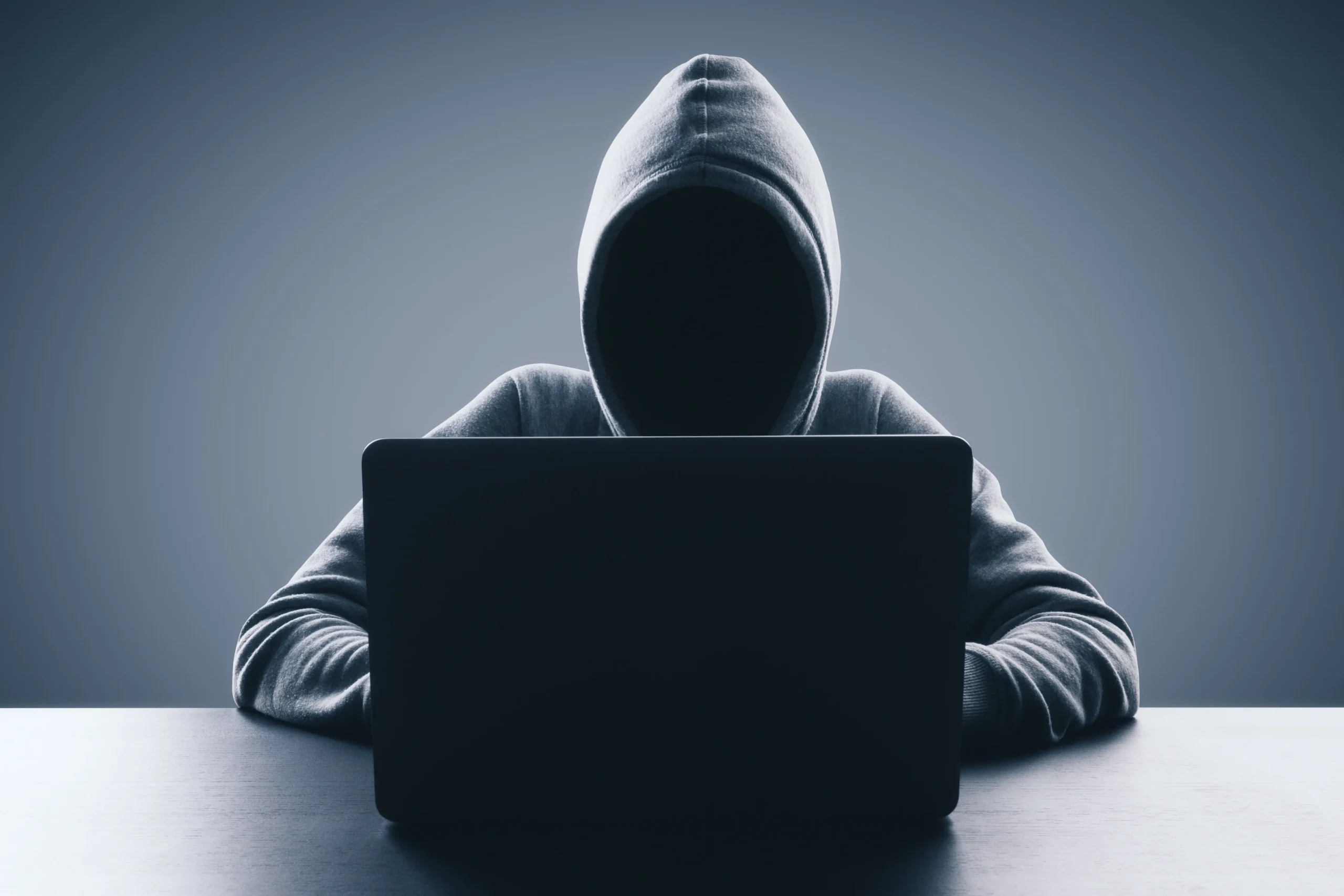 FSCA Warns the Public About Individuals Impersonating Everest Wealth Management Pty Ltd (Hacker/Imposter behind a laptop)