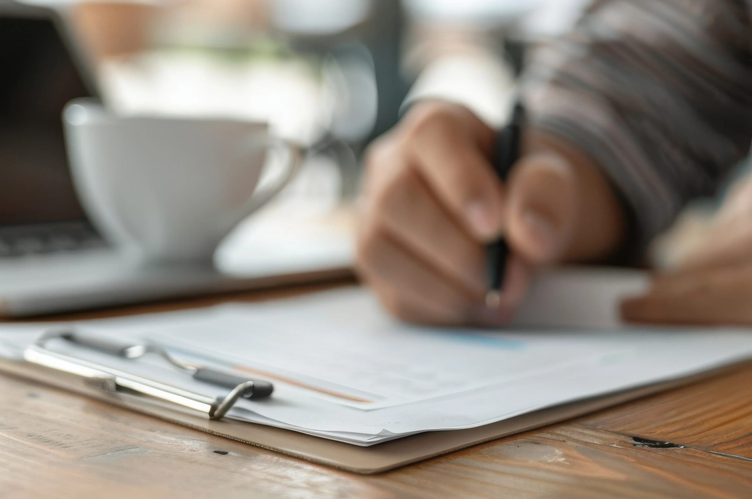 South African Economy Moves as Market Gains (Man making edits to a report)