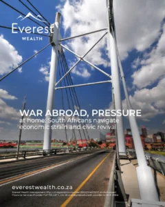 War Abroad & Pressure at Home (view of a city from a bridge)