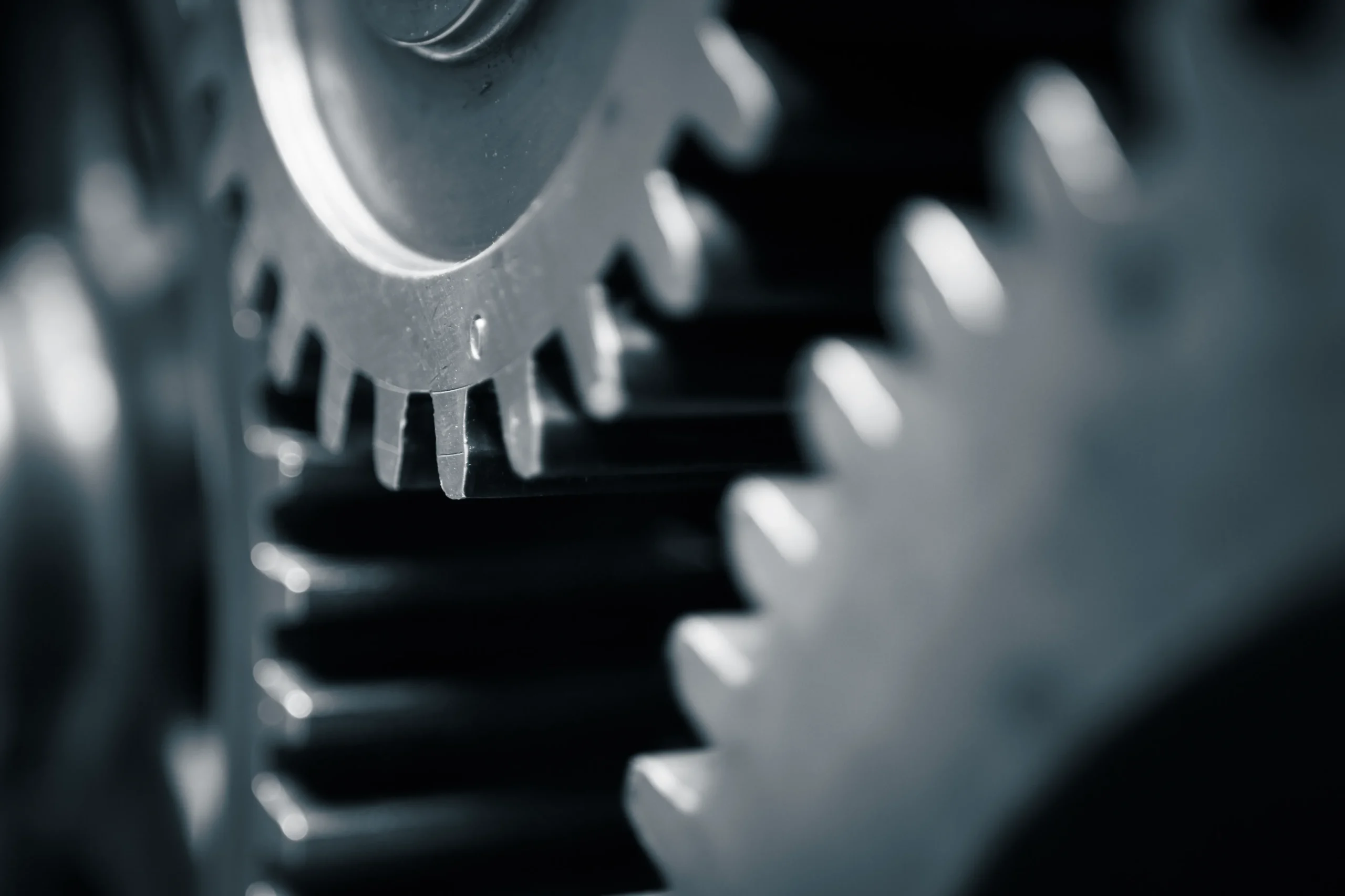 SA’s Biggest Risk is Slow Implementation (close up view of cogs)