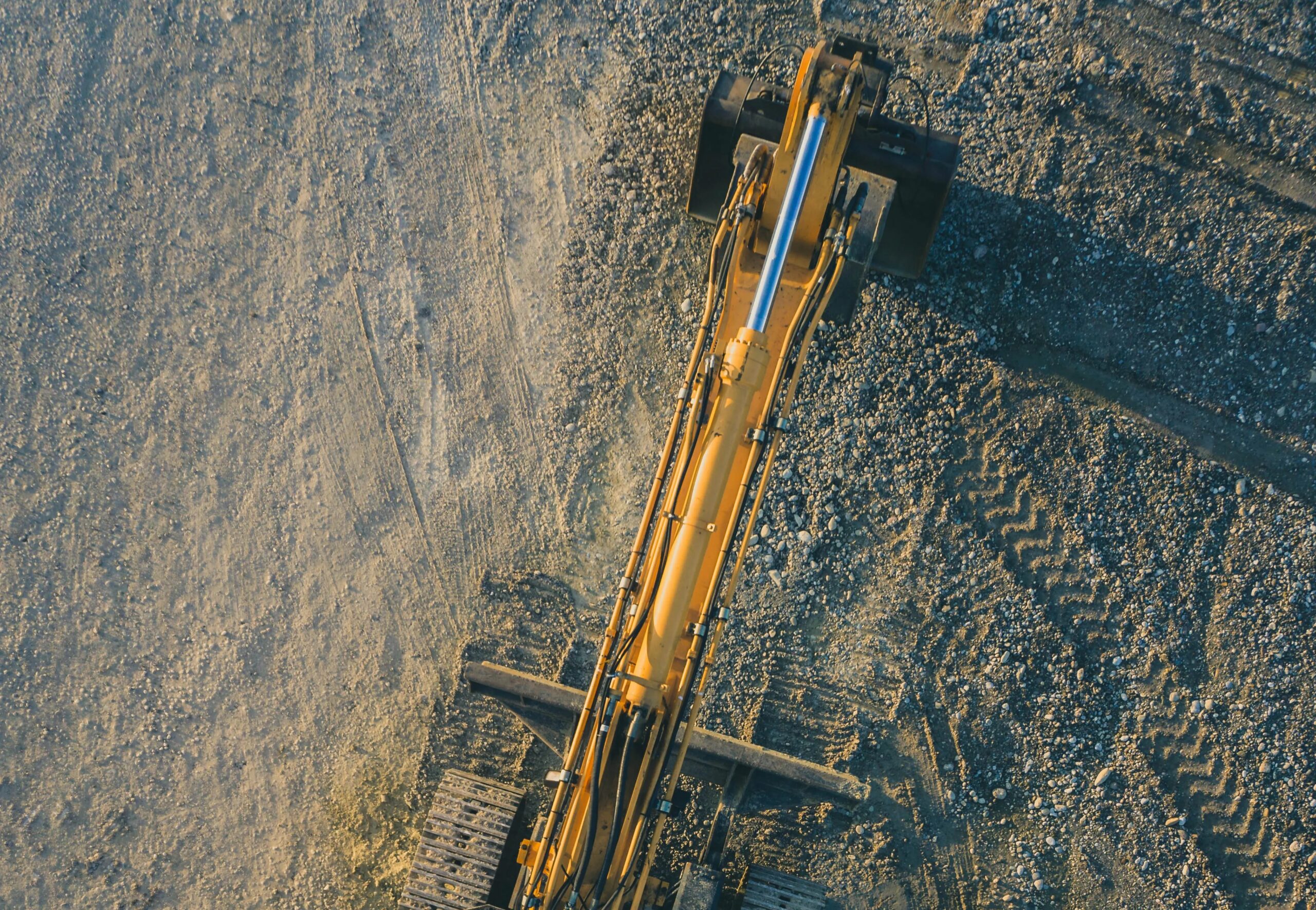 JSE Rallies on Mining Surge & Retail Growth (top view of a mining excavator)