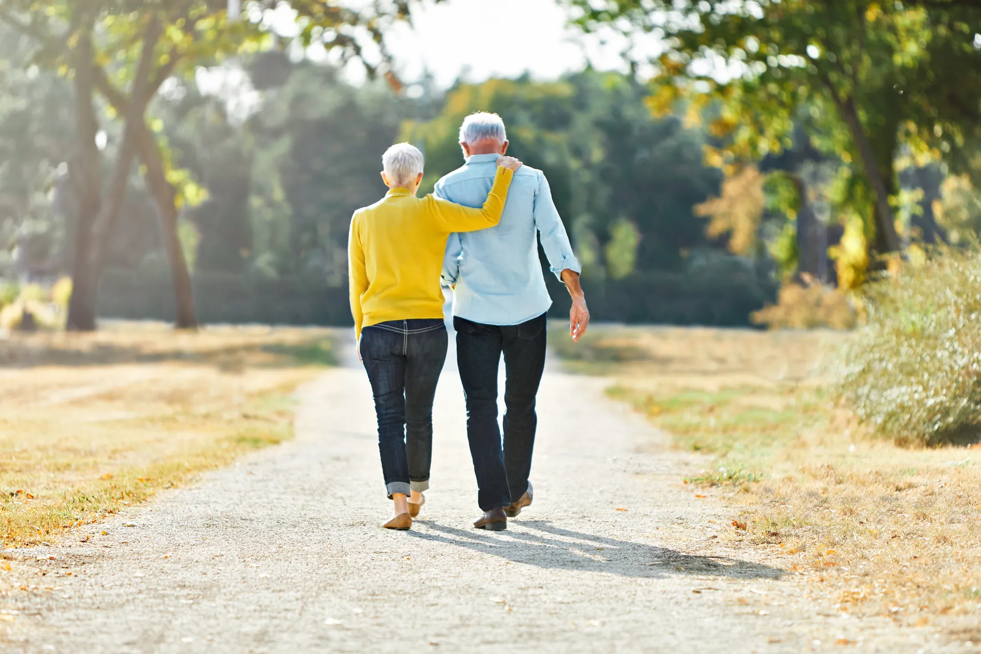 Retire Comfortably in South Africa | Everest Wealth (Elderly couple walking on an outdoor path)