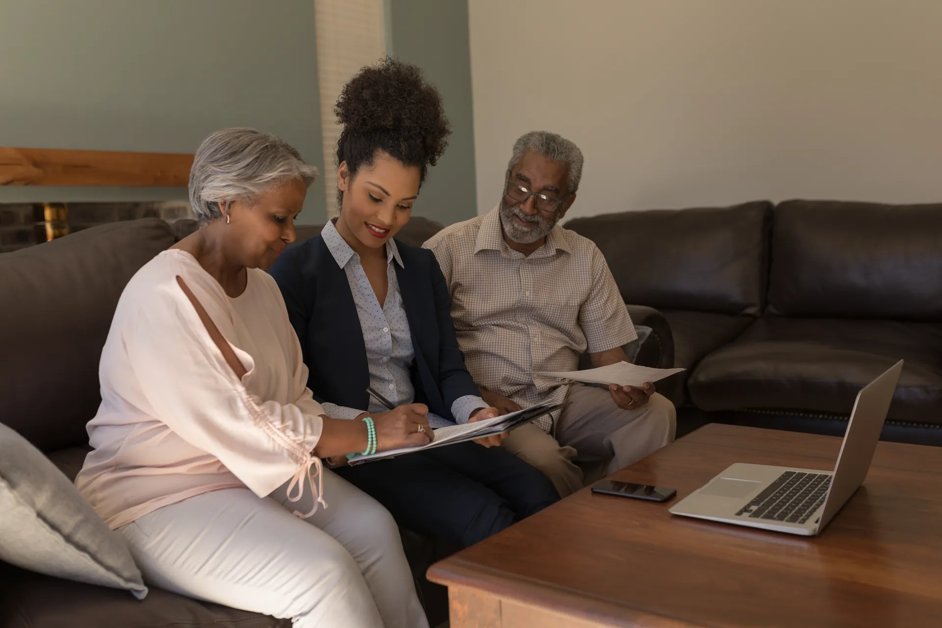 Retire Comfortably in South Africa | Everest Wealth (Elderly couple speaking to a financial advisor)