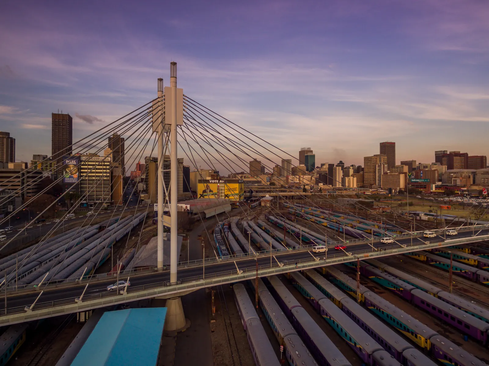 Weaker Growth Outlook Pressures the MTBPS (Cityscape & trainstation at dawn)